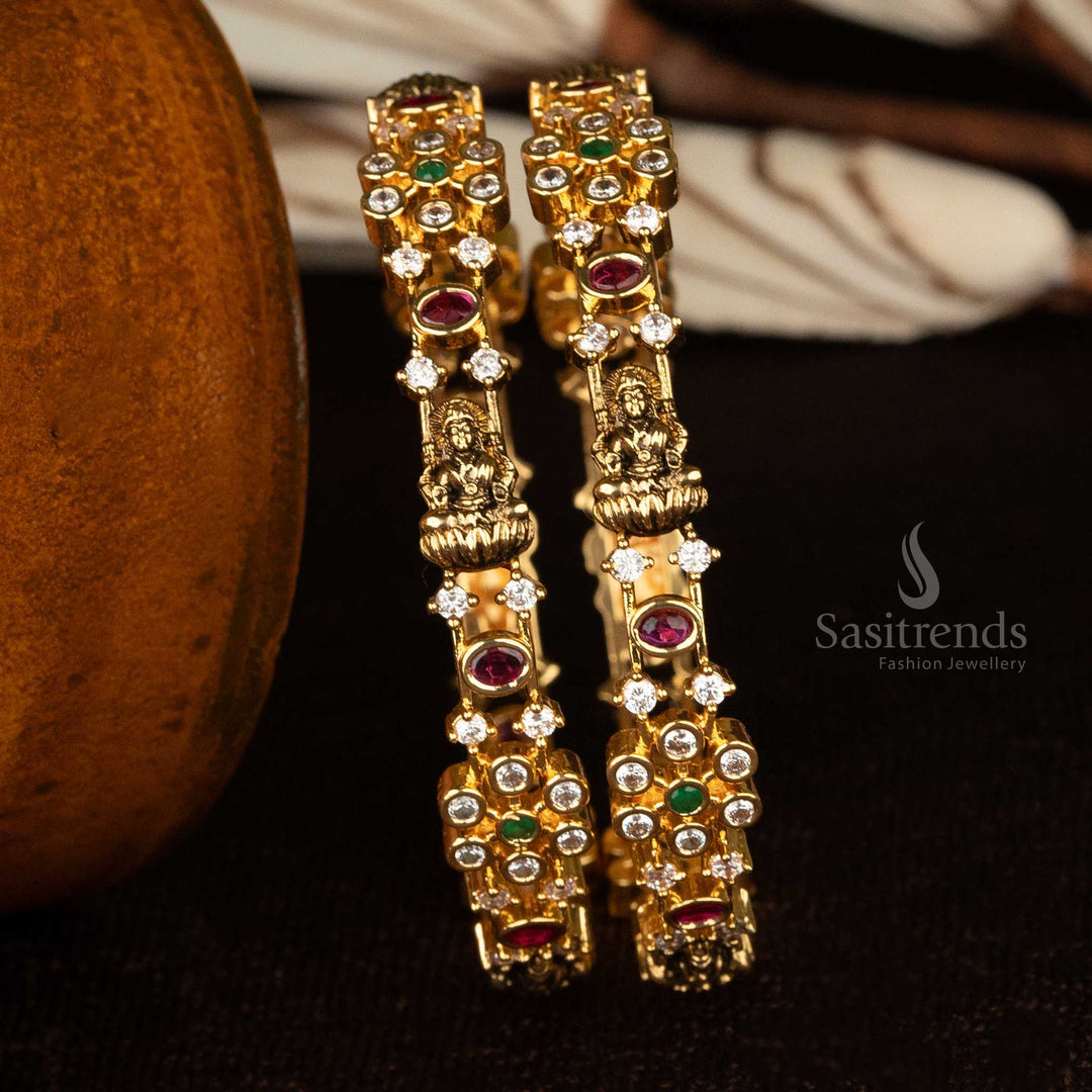 Temple bangles with Lakshmi and floral AD stone detailing - Sasitrends