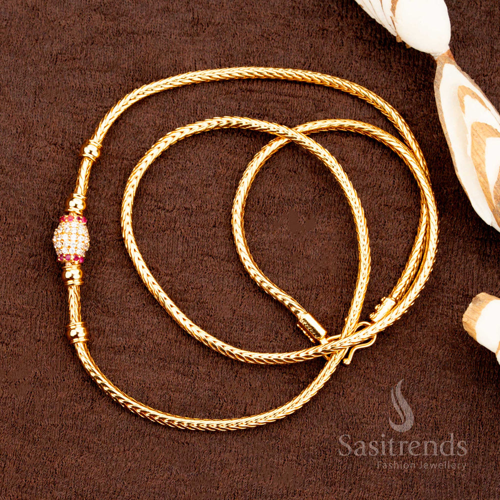 Glamorous white-ruby micro gold plated Mugappu chain with oval ball links and radiant AD stone center, perfect for saree styling – sasitrends
