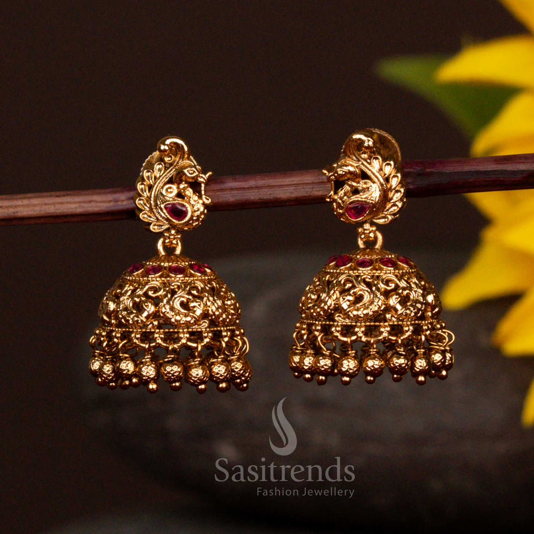 Antique style bridal jhumkas with peacock design and bead fringe - Sasitrends