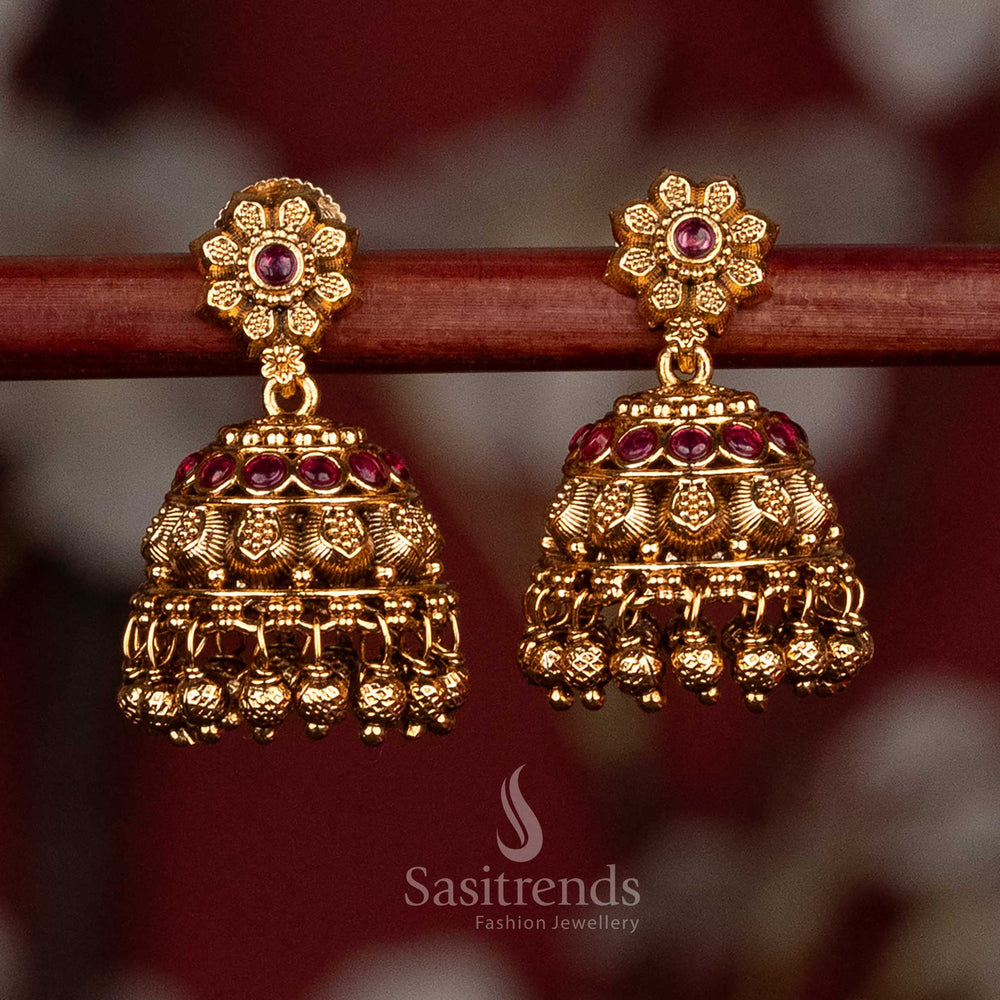 Heritage high-quality matte gold plated floral stud screw type jhumka earrings with intricate detailing