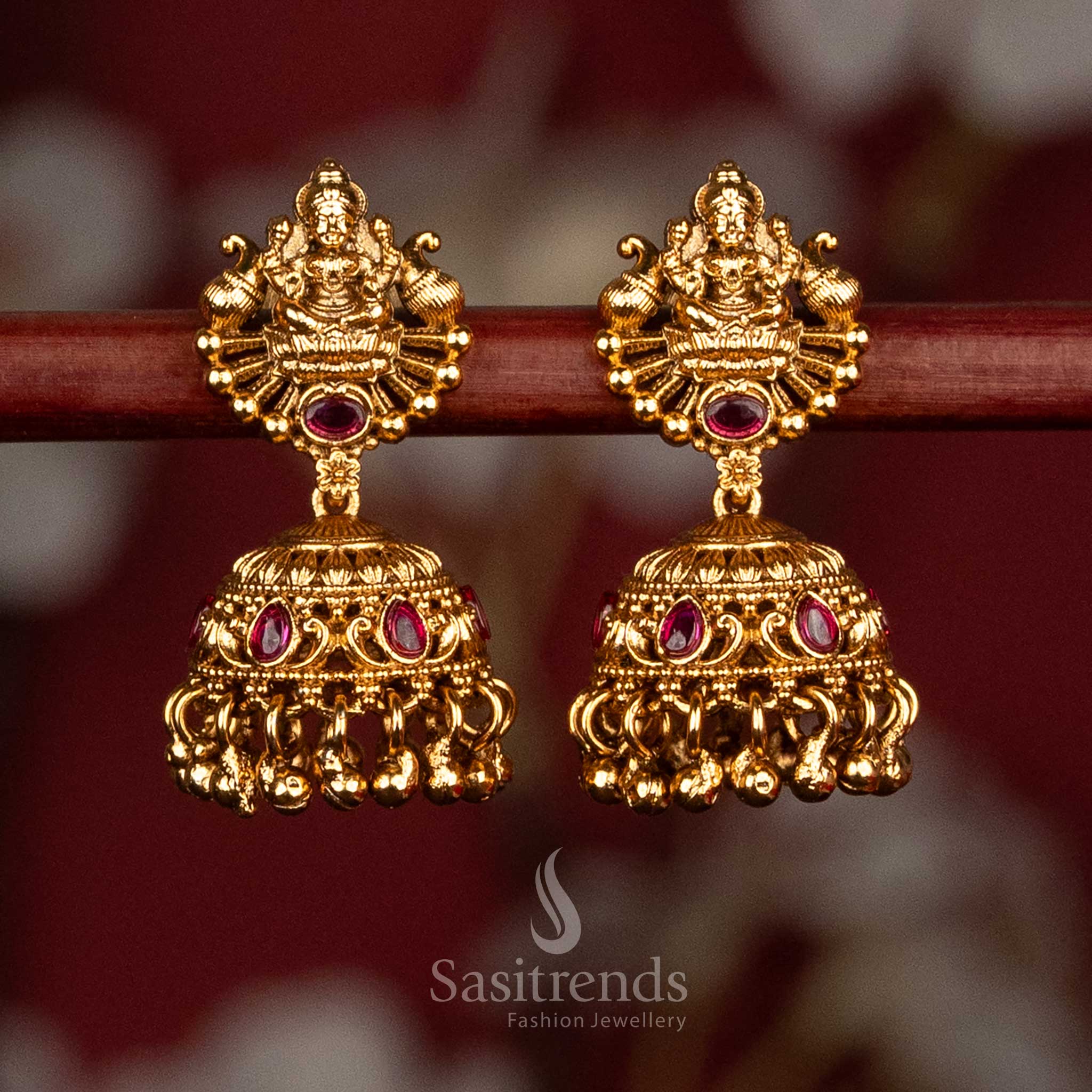 Premium matte gold plated ruby temple dual peacock Goddess Lakshmi jhumka earrings with screw type back for ceremonial and festive wear-sasitrends