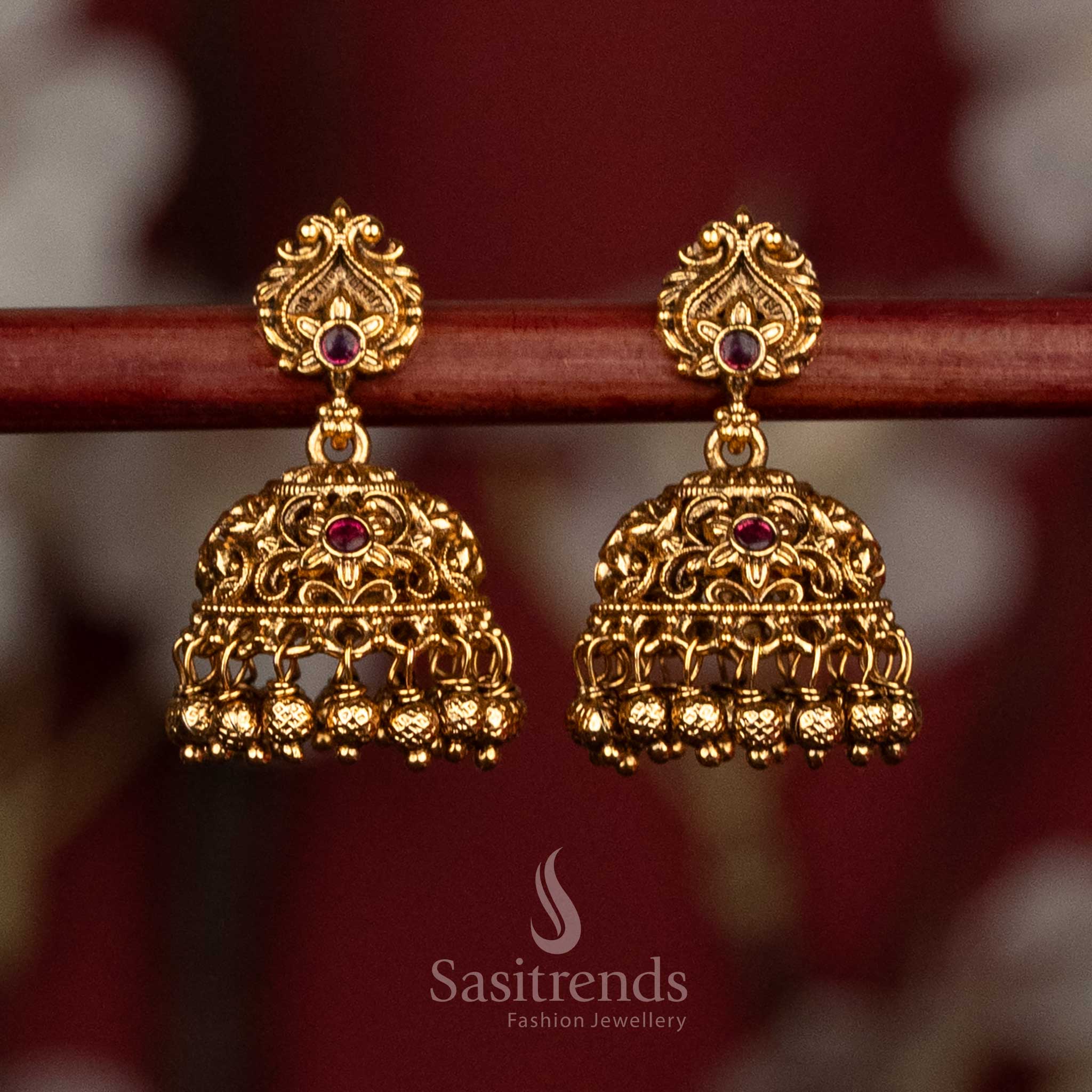 Divine heritage matte gold plated ruby peacock floral filigree jhumkas with golden ghungroo detailing for temple festive jewellery - Sasitrends