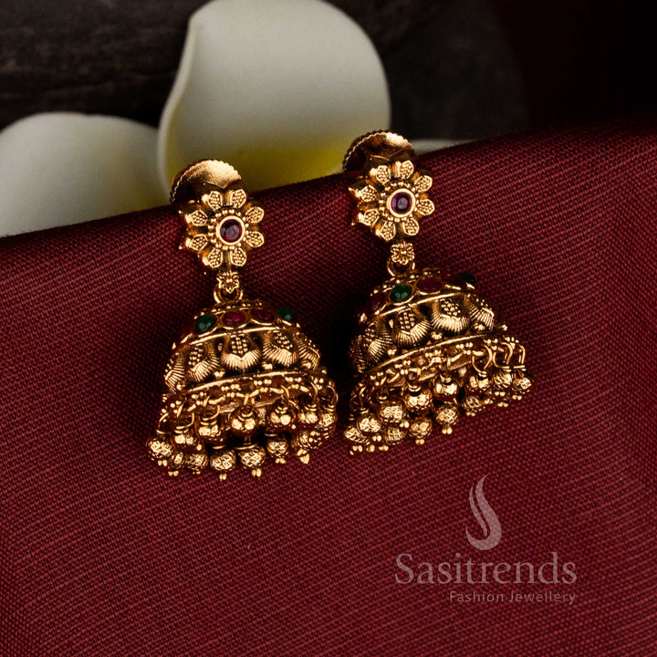 Traditional high-quality temple-style floral jhumka earrings in matte gold plating with filigree and granulated work, screw type back