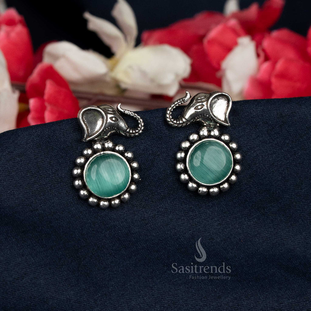 Sasitrends ethnic earrings featuring elephant and circular gem - Sasitrends