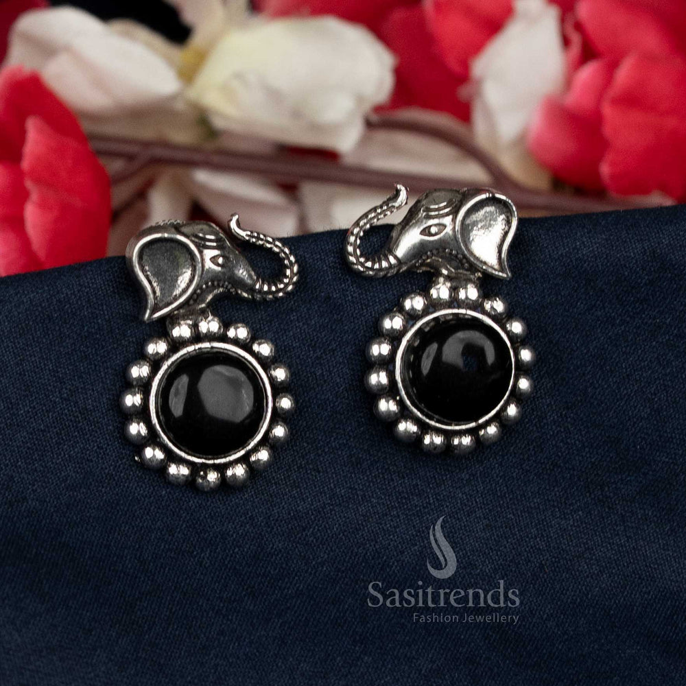 Sasitrends ethnic earrings featuring elephant and circular gem - Sasitrends