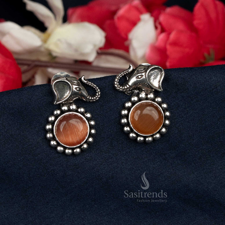 Oxidised stud earrings with elephant head and round stone