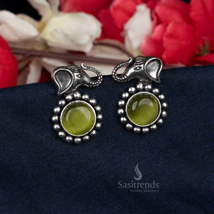 Oxidised stud earrings with elephant head and round stone