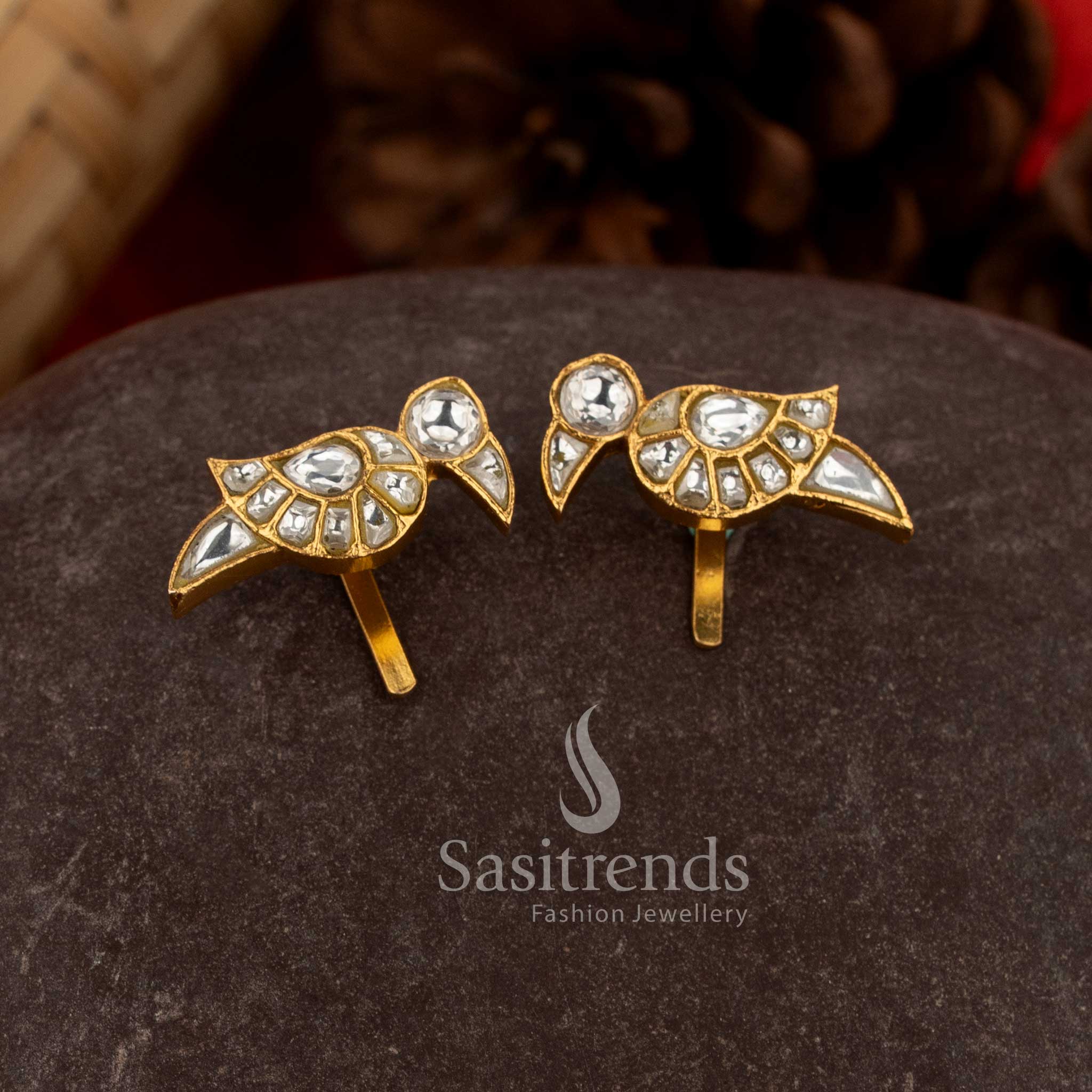 Sacred white kundan jadau bugadi ear cuffs featuring parrot artistry for cultural occasions - Sasitrends