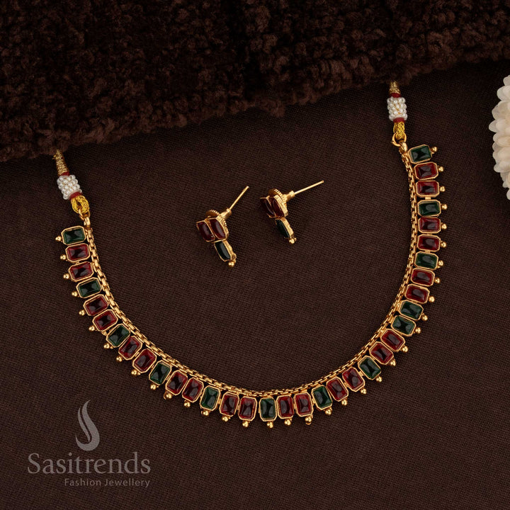 Stunning Classic Matte Gold Plated Necklace Jewellery Set With Rectangular Stones In Ruby-Green Colour Featuring Elegant Kemp Stone Detailing, Pearl Hangings, And Intricate Matte Gold Finish For Traditional Saree And Festive Wear – Sasitrends
