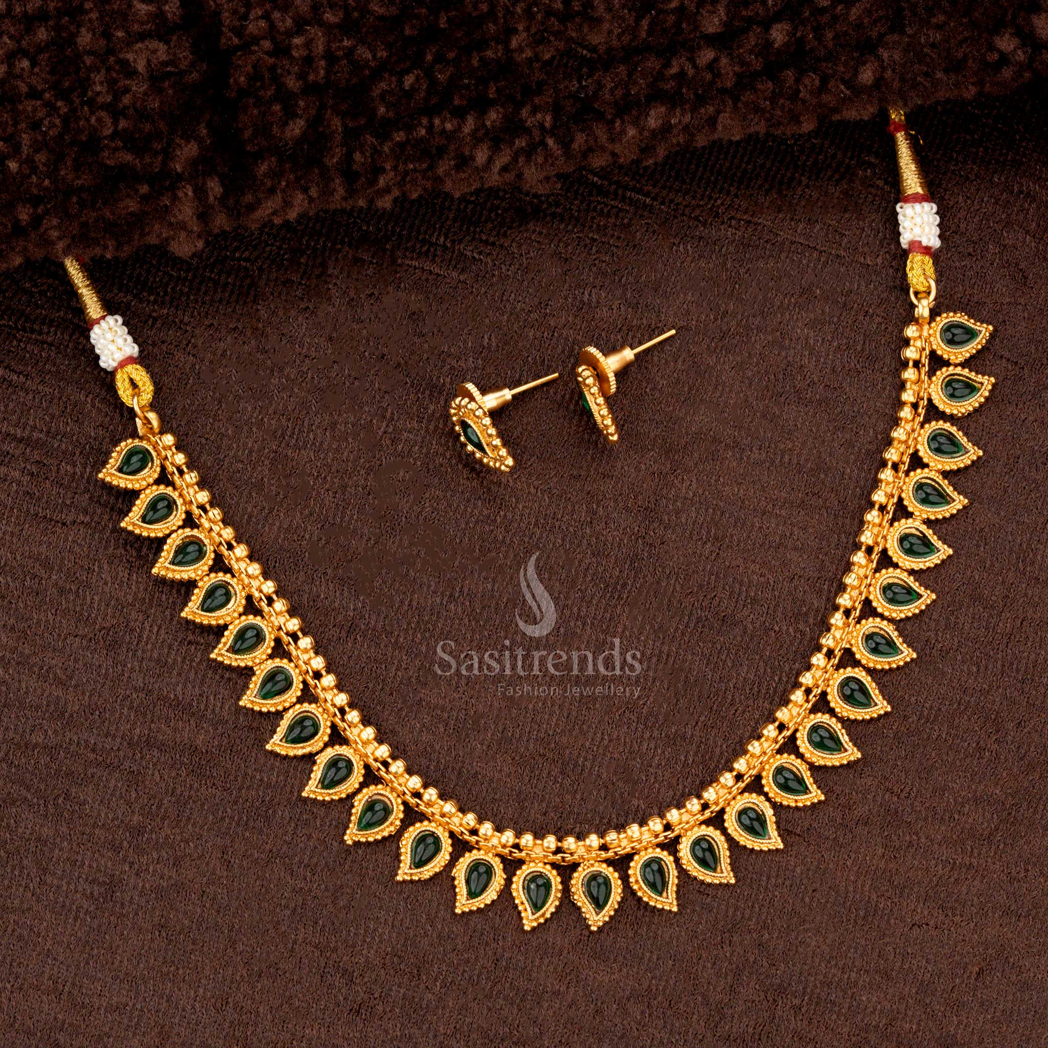 Timeless green teardrop design necklace and earrings set, suitable for festive and wedding wear - Sasitrends