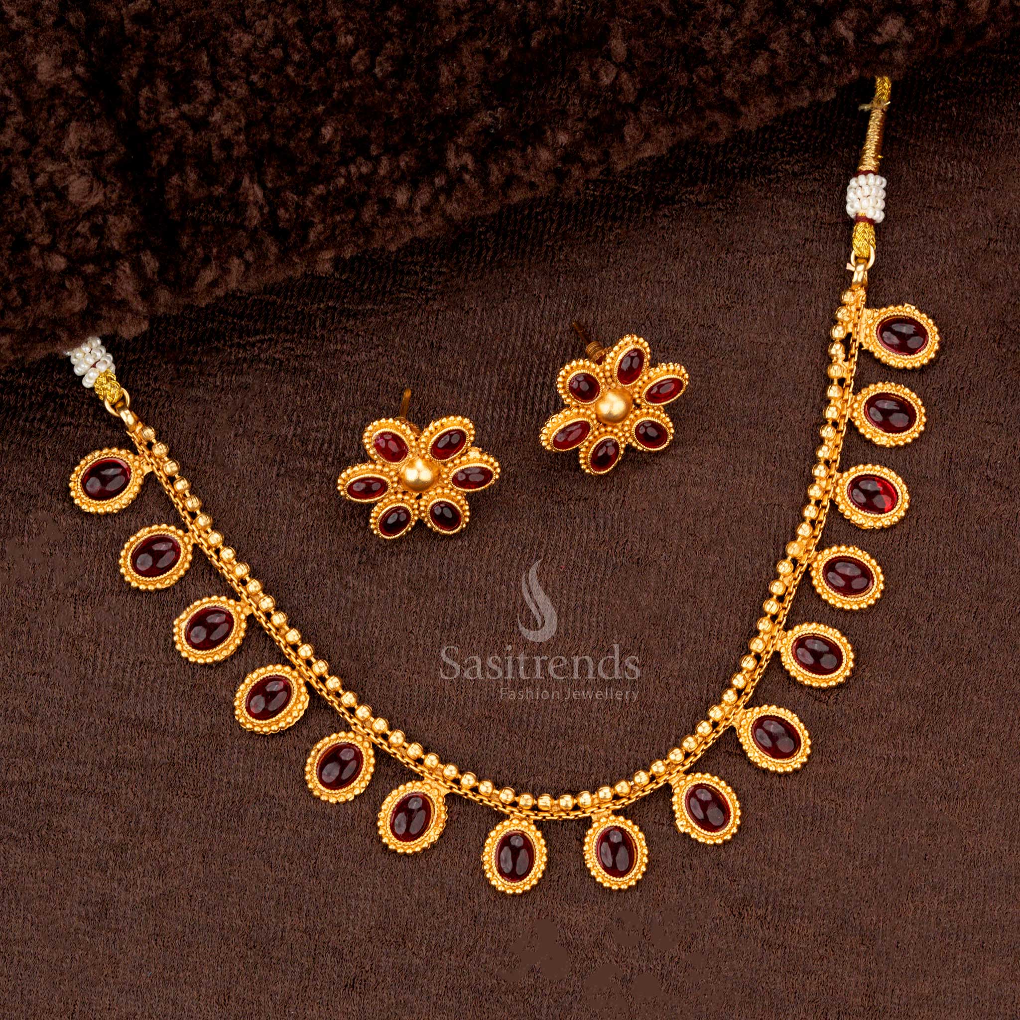 Ruby oval motif necklace set  in matte gold plating with matching floral earrings - Sasitrends