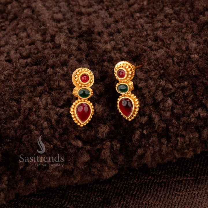 Festive matte gold-plated jewellery with classic ruby-green stone accents - Sasitrends