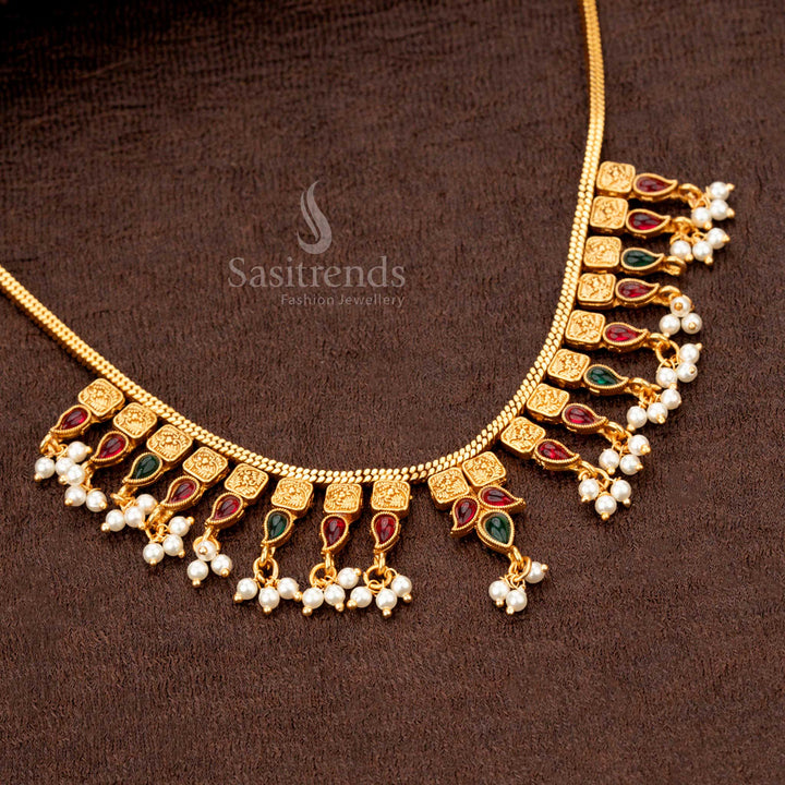Festive temple necklace featuring ruby-green drop designs and floral square engravings - Sasitrends