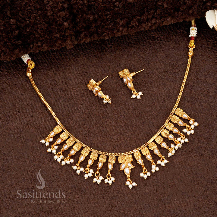 Pearl-accented temple jewellery featuring elegant drop-shaped detailing - Sasitrends