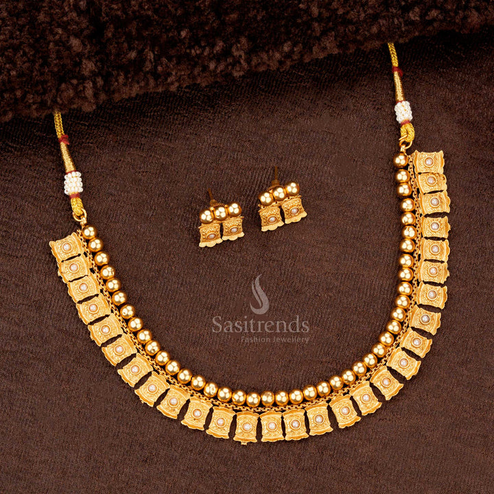 Classic temple necklace with engraved square motifs, gold beads, and pearl accents - Sasitrends
