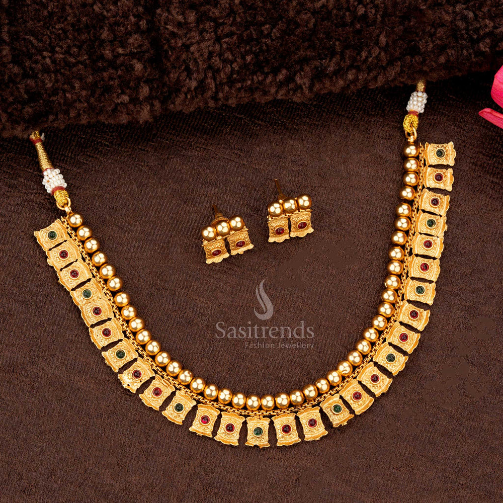 Festive temple jewellery featuring ruby-green accents and engraved motifs - Sasitrends