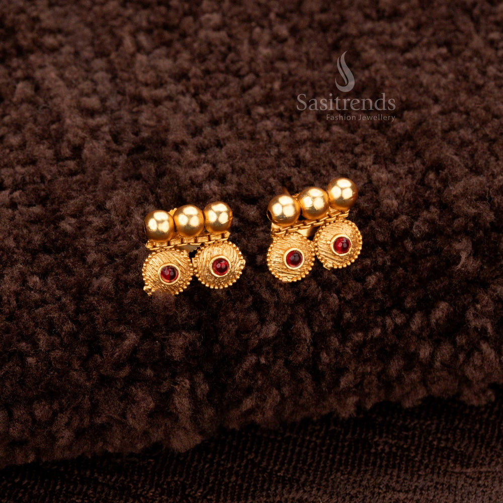 Elegant ruby-accented floral motif jewellery set in matte gold - Sasitrends
