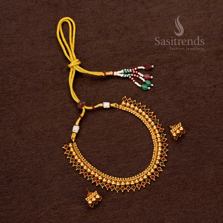 Matte gold-plated temple necklace featuring layered round motifs and polished bead accents - Sasitrends