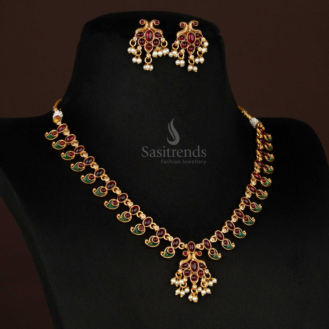 Classic temple jewellery set in ruby-green with matte gold leaf motifs and elegant pearl accents – a perfect bridal finishing touch steeped in traditional allure – Sasitrends