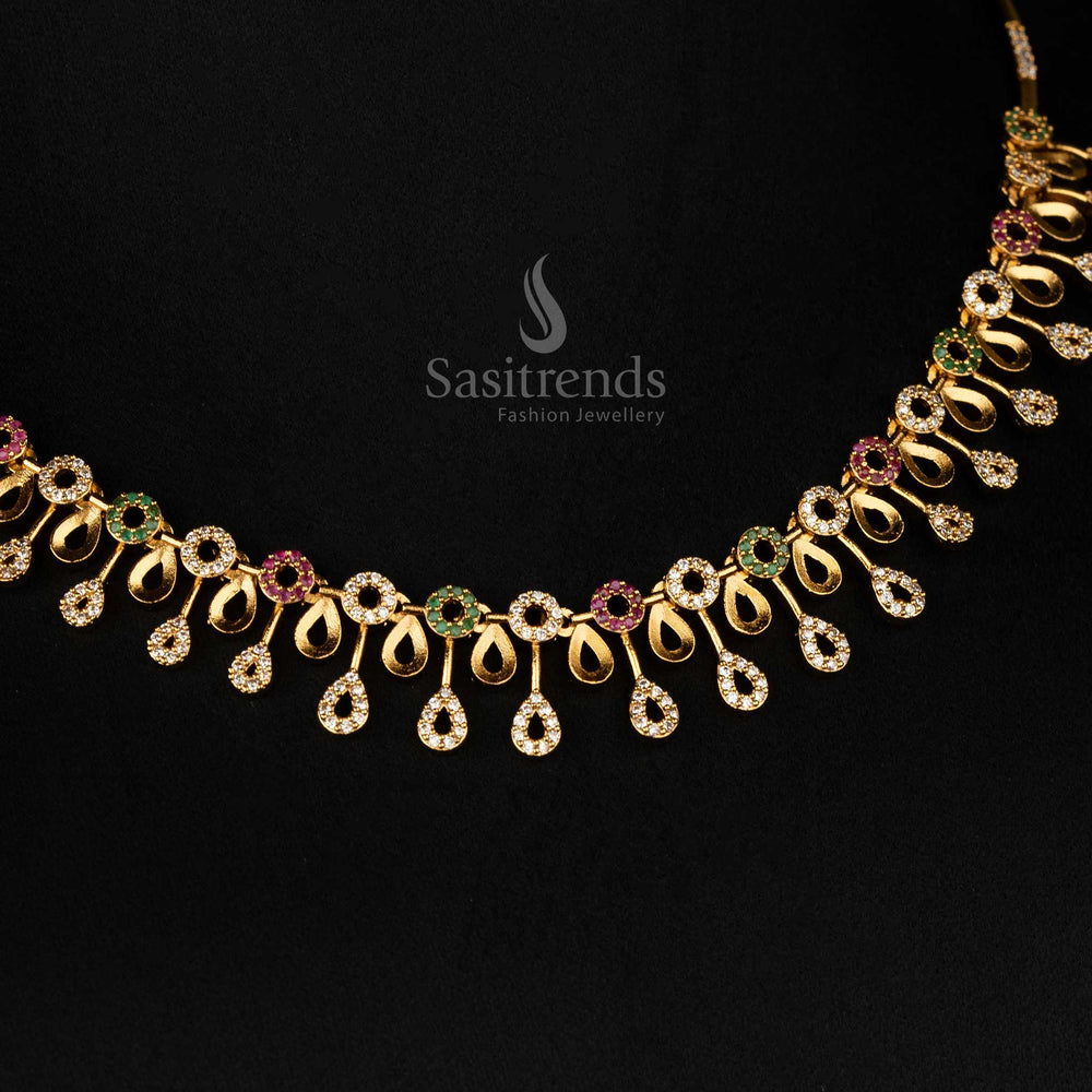 American diamond teardrop and floral motif jewellery set with matte gold finish - Sasitrends
