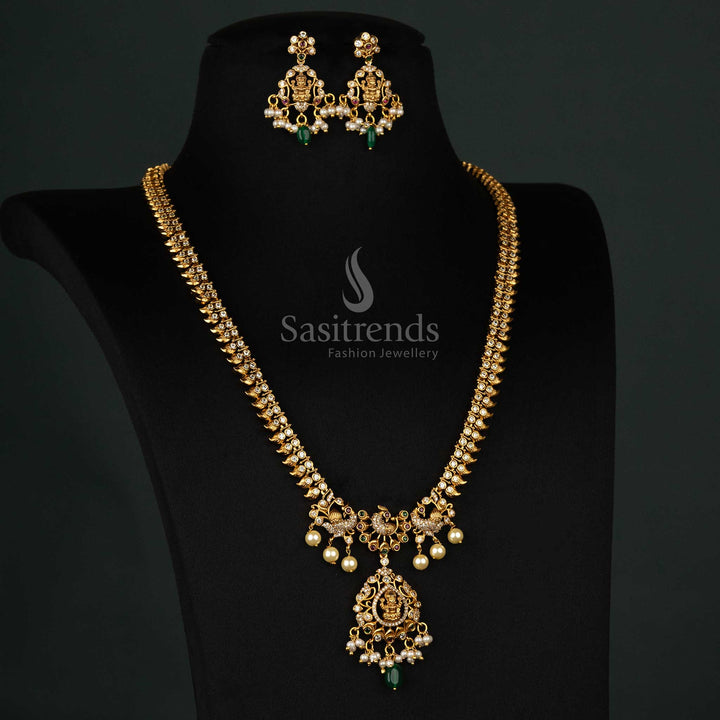 Artistic temple jewellery set with a peacock motif, ruby-green AD stones, green beads, and matte gold plating - Sasitrends
