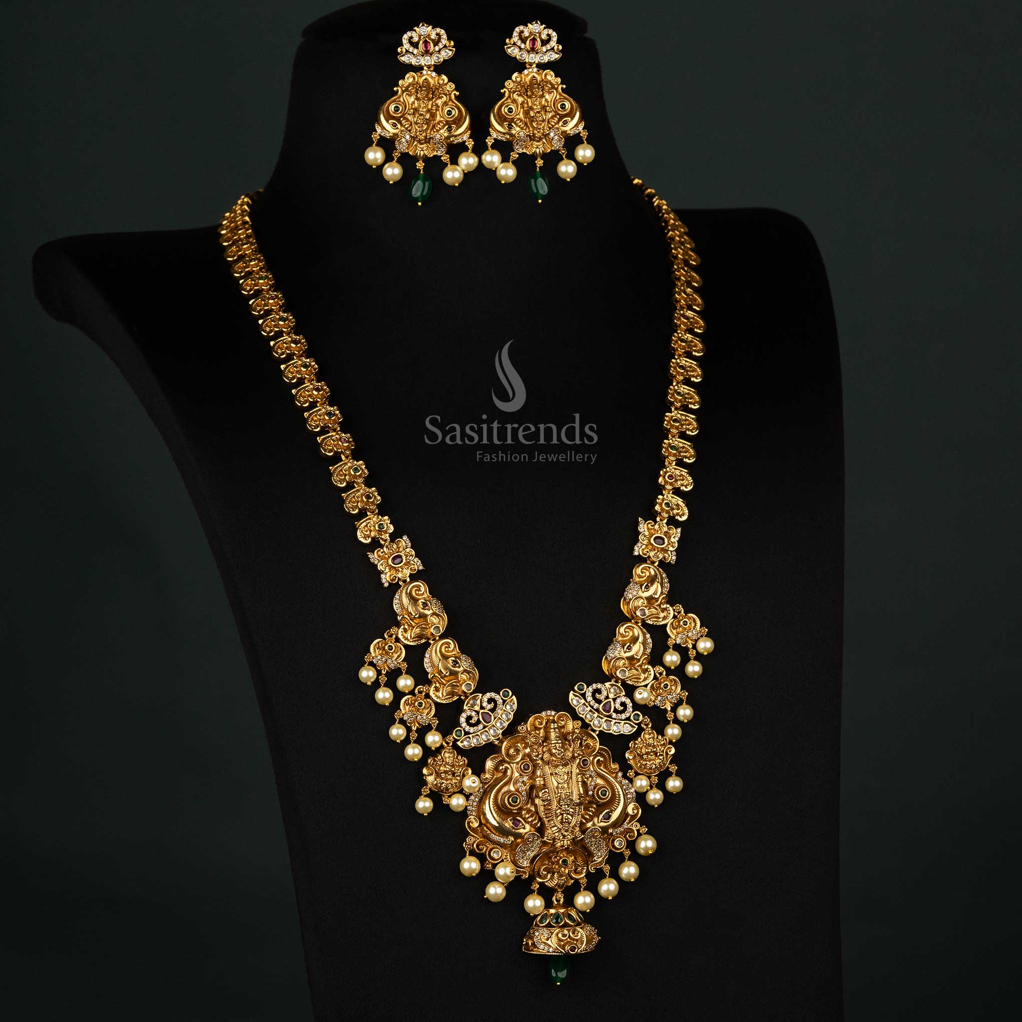 Majestic bridal temple matte gold-plated jewellery set featuring a Lord Balaji pendant, elephant motifs, pearls, and colored stones - Sasitrends