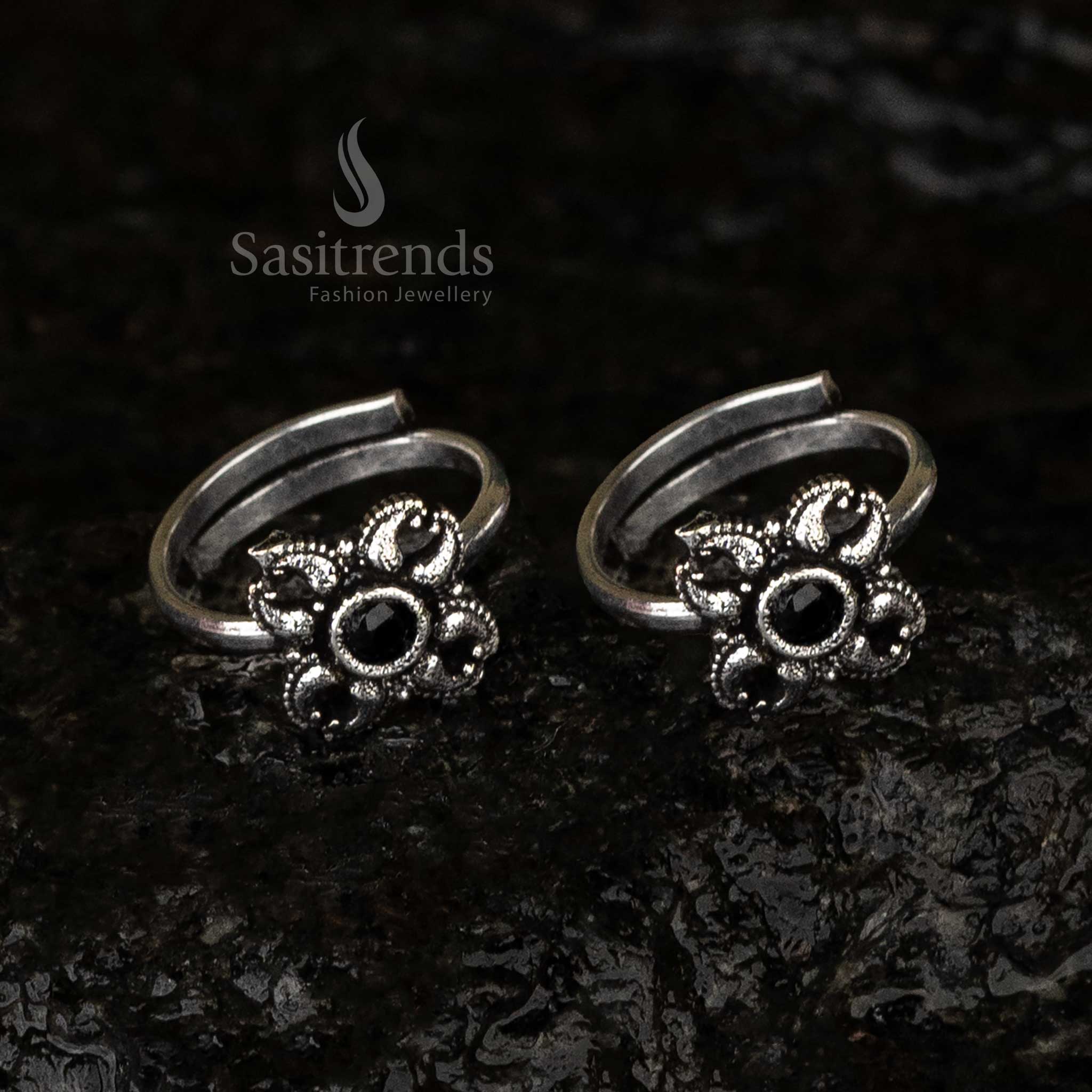 Oxidised adjustable floral toe rings combo with bold black details, featuring a striking and sophisticated design - Sasitrends