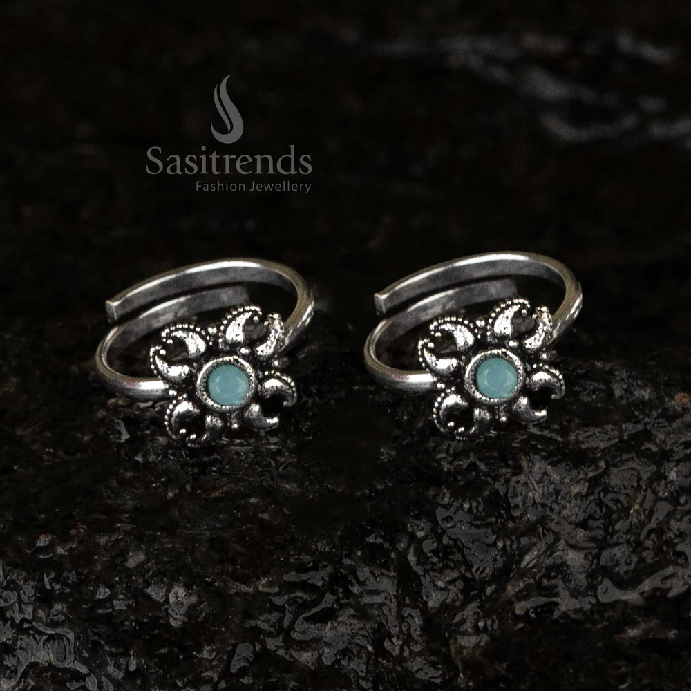 Beautiful oxidised floral toe rings with mint highlights, adding a touch of elegance and sophistication - Sasitrends