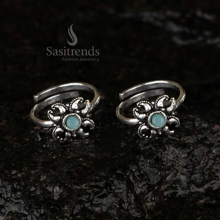 Beautiful oxidised floral toe rings with mint highlights, adding a touch of elegance and sophistication - Sasitrends