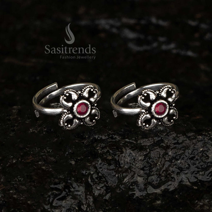 Stunning oxidised floral toe rings with ruby hues, featuring intricate designs for a bold and sophisticated look - Sasitrends