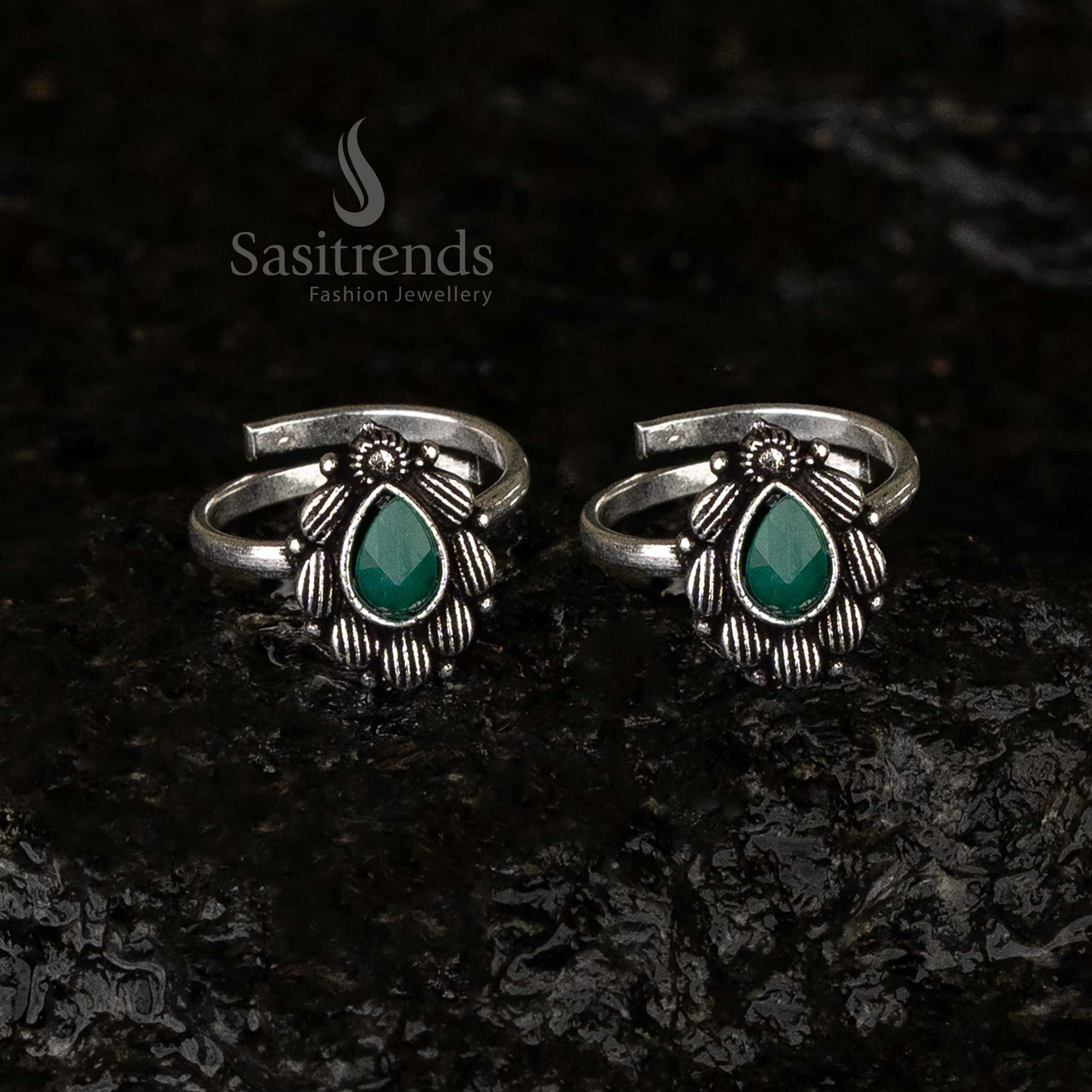 Adjustable green teardrop toe ring with oxidised silver petal motif and comfortable fit - Sasitrends