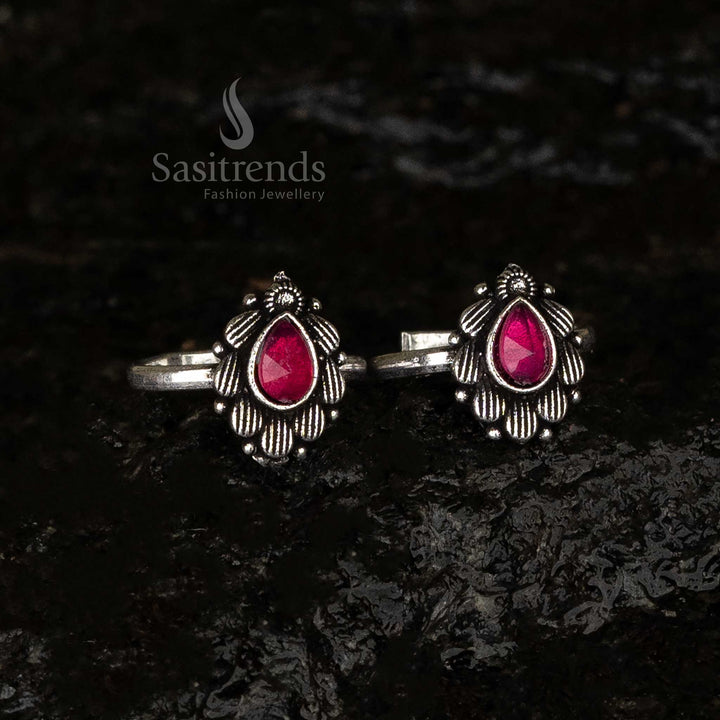 Vibrant ruby teardrop toe ring with oxidised petal motif and adjustable band - Sasitrends