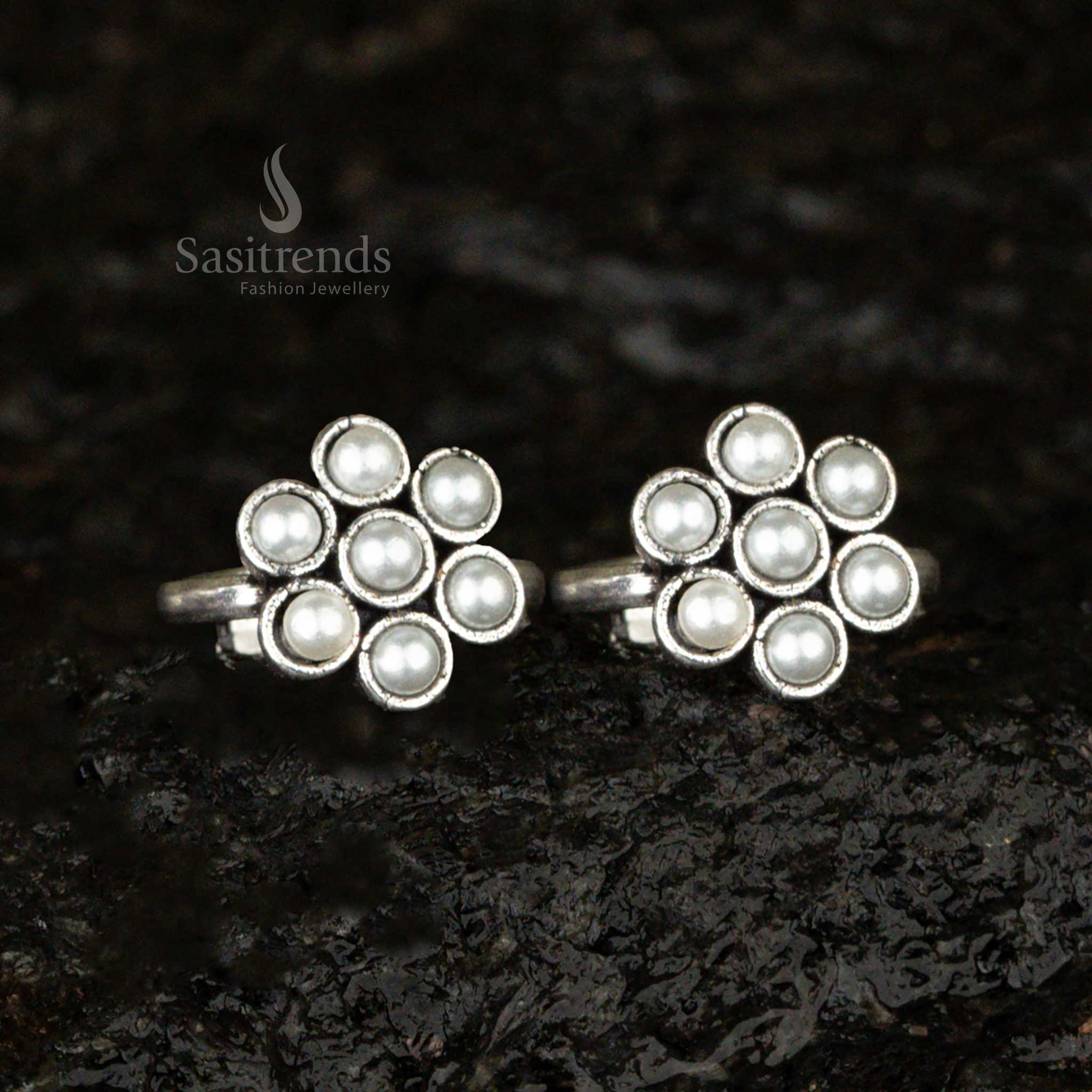 Oxidised adjustable toe ring with a classic pearl stone in a flower design, embodying timeless antique charm - Sasitrends