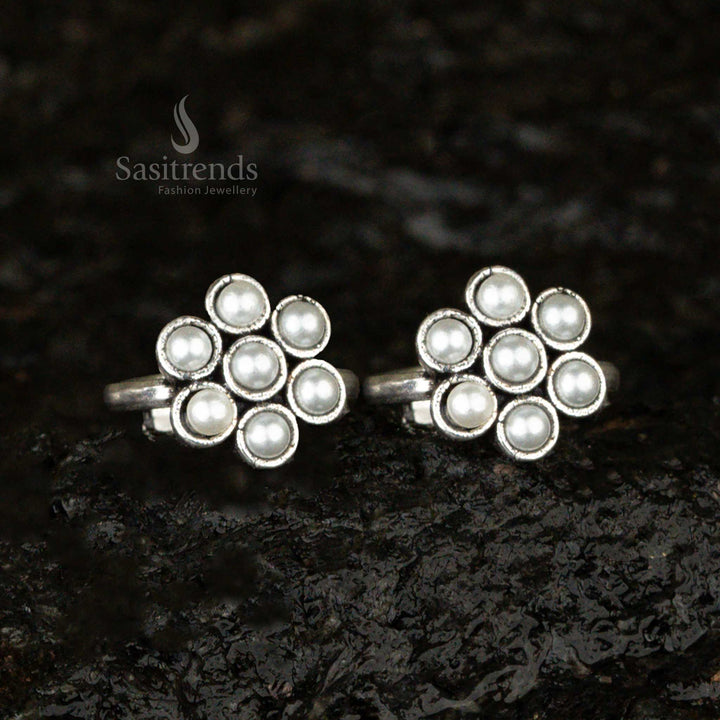 Oxidised adjustable toe ring with a classic pearl stone in a flower design, embodying timeless antique charm - Sasitrends