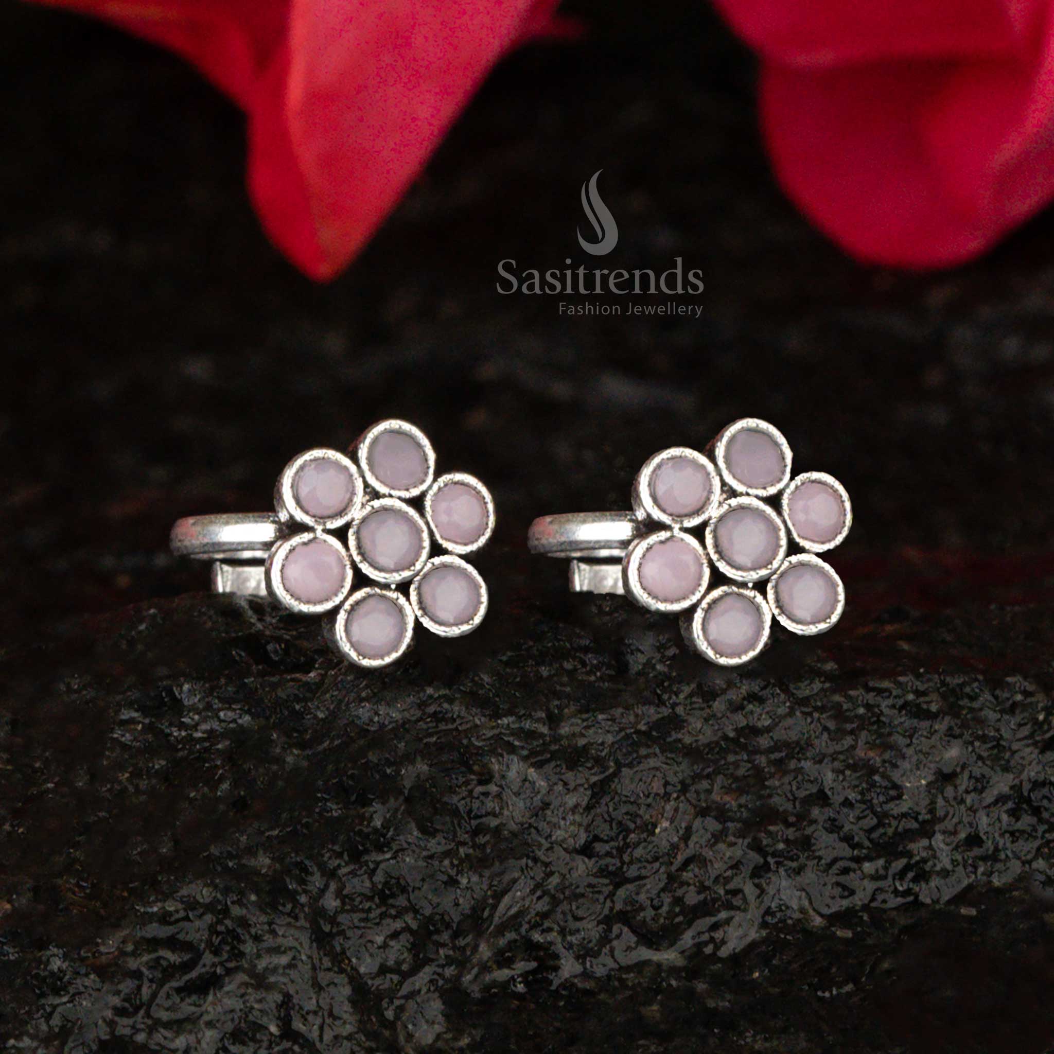 Oxidised toe ring featuring mint green and pink stones in a charming floral pattern, exuding a soft pastel glow - Sasitrends