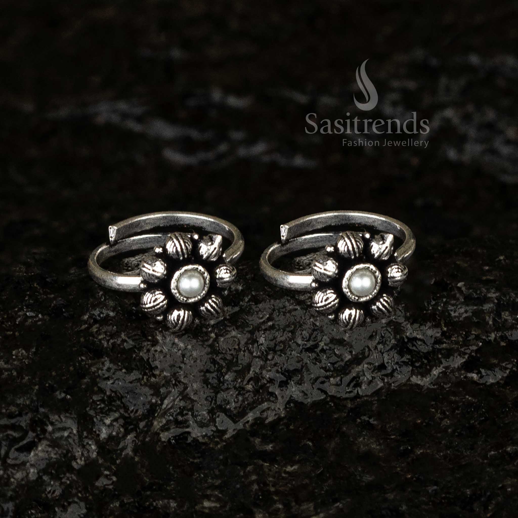 Oxidised adjustable toe ring featuring a lustrous pearl centerpiece surrounded by delicate petal-inspired designs, offering a timeless vintage elegance - Sasitrends
