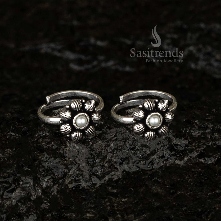 Oxidised adjustable toe ring featuring a lustrous pearl centerpiece surrounded by delicate petal-inspired designs, offering a timeless vintage elegance - Sasitrends