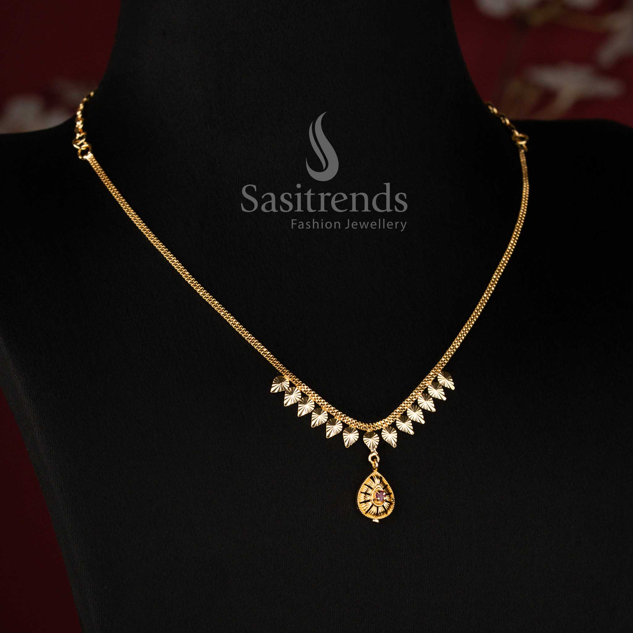 A celestial aura-inspired micro gold plated trendy necklace, beautifully crafted with a modern pendant and floating hanging accents - Sasitrends