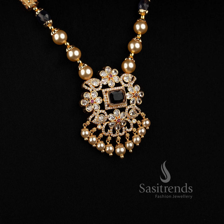 Micro gold plated pearl strand jewellery set with American Diamond square pendant motifs and elegant drop design