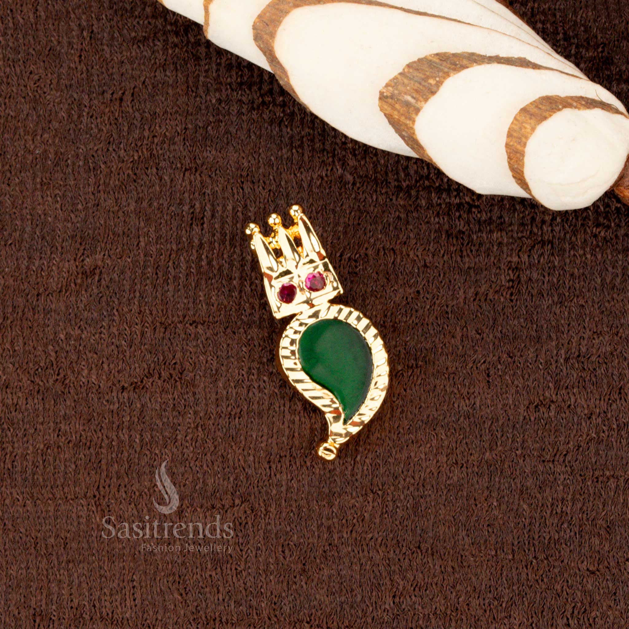  Gorgeous South Indian festive jewelry featuring an olive green Palakka mango pendant with a radiant gold plating and sparkling AD stones for a luxurious ethnic look - Sasitrends