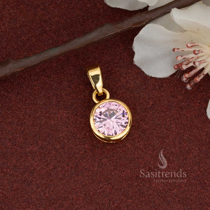 Glamorous micro gold plated solitaire pendant featuring a soft pink AD stone, blending feminine grace with a lavish touch for special moments - Sasitrends