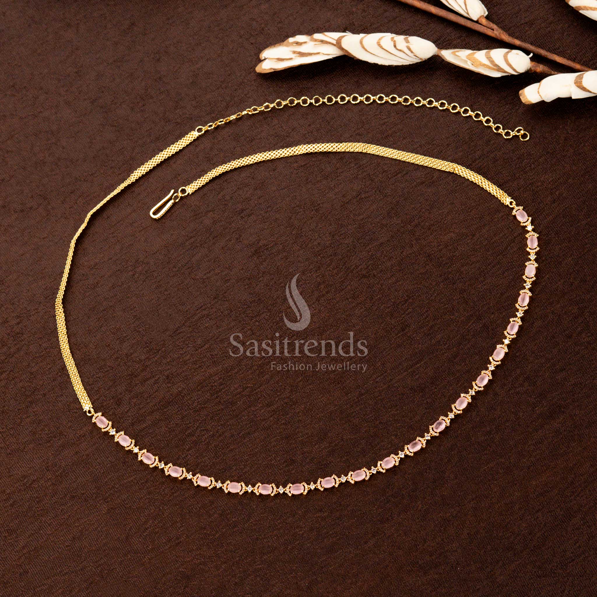 Charming pink American diamond gold-plated hip belt featuring sparkling stones, a delicate single-line design, and timeless elegance—perfect for traditional sarees and festive styling - Sasitrends