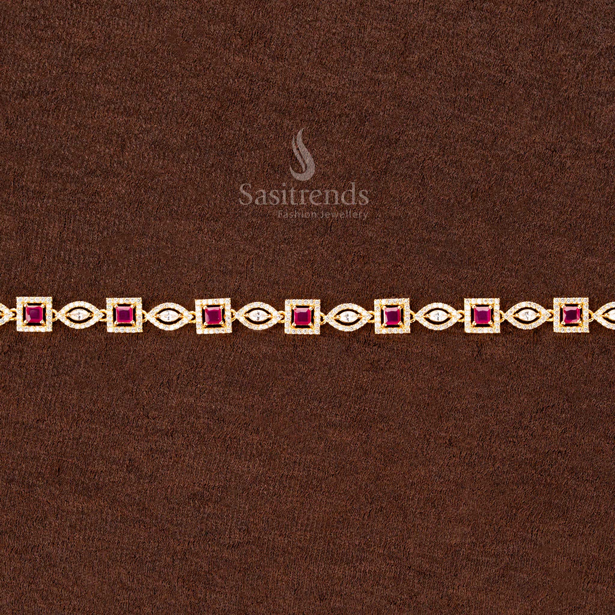 Dazzling ruby American diamond gold-plated single-line hip belt featuring sparkling square and navette stones, an intricate design, and a luxurious finish—perfect for festive sarees and bridal fashion - Sasitrends