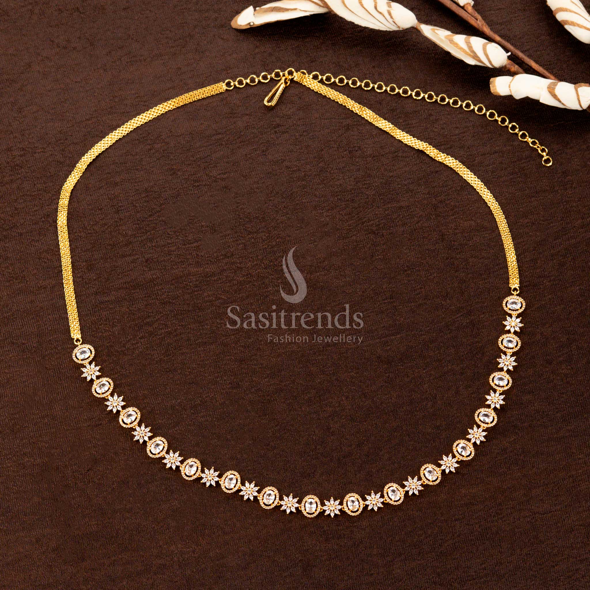 Elegant pure white American diamond hip chain with a lustrous oval stone, refined floral craftsmanship, and a sophisticated touch—an impeccable choice for traditional occasions - Sasitrends