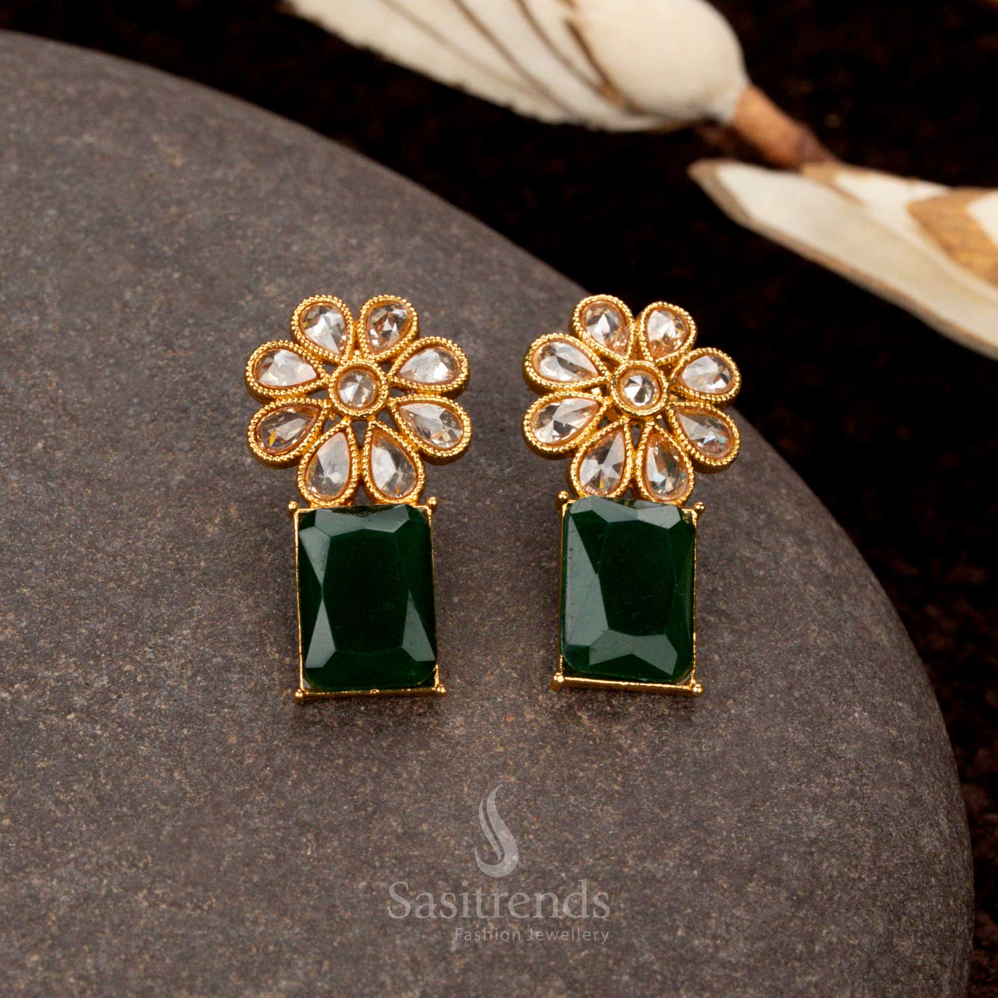 Elegant antique gold-plated green stone earrings with floral and rectangular artistry, a stunning ethnic jewellery addition for festive occasions - Sasitrends
