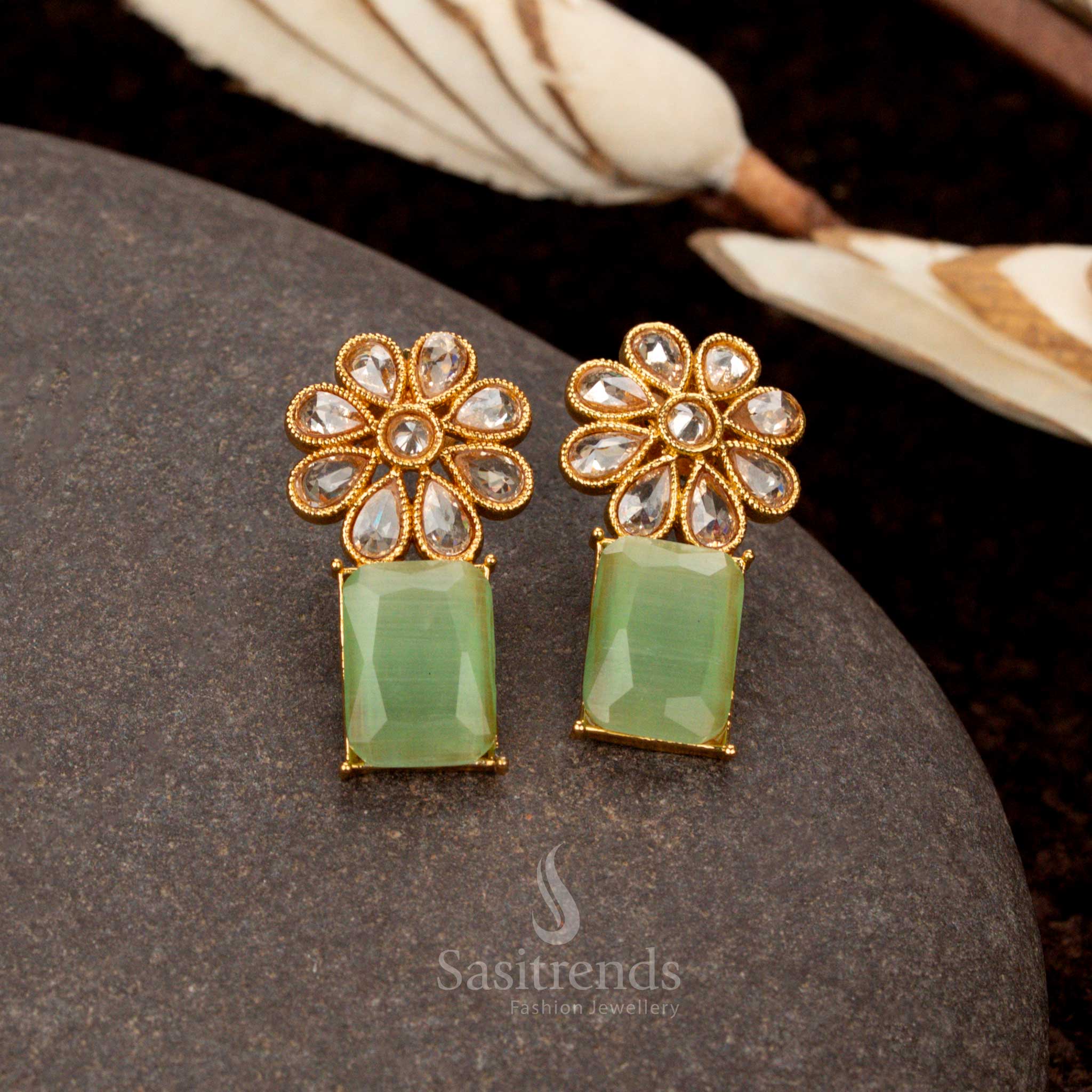 Antique gold-plated lite-green stone earrings, designed with intricate floral and rectangular craftsmanship, a premium ethnic jewellery selection for women - Sasitrends