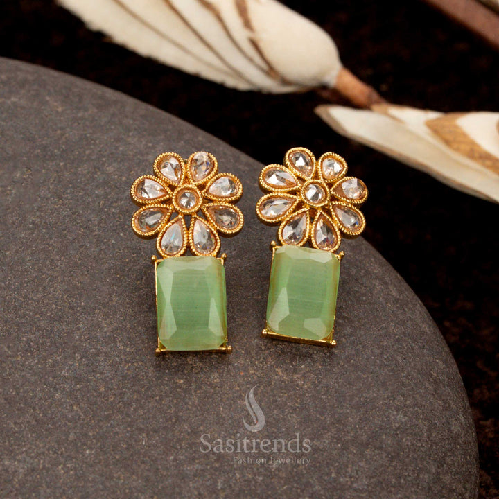 Antique gold-plated lite-green stone earrings, designed with intricate floral and rectangular craftsmanship, a premium ethnic jewellery selection for women - Sasitrends