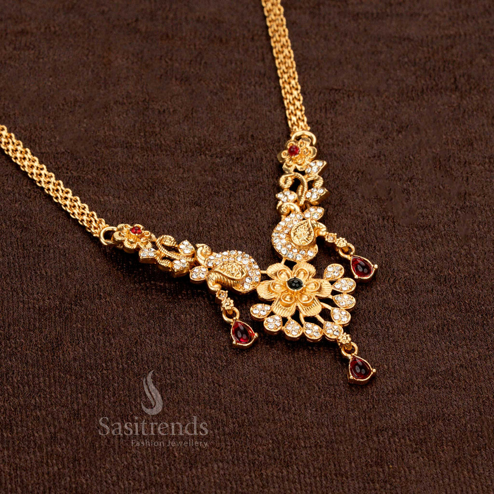Divine matte gold floral necklace set with brilliant stone detailing and peacock accents - Sasitrends