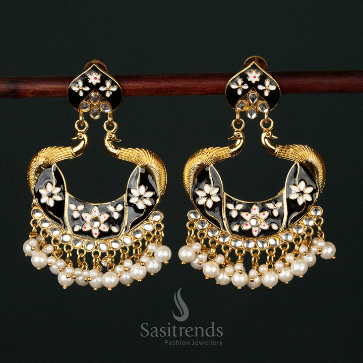 Striking black gold plated painted peacock pearl earrings featuring an artistic peacock design, an elegant statement piece for festive celebrations - Sasitrends