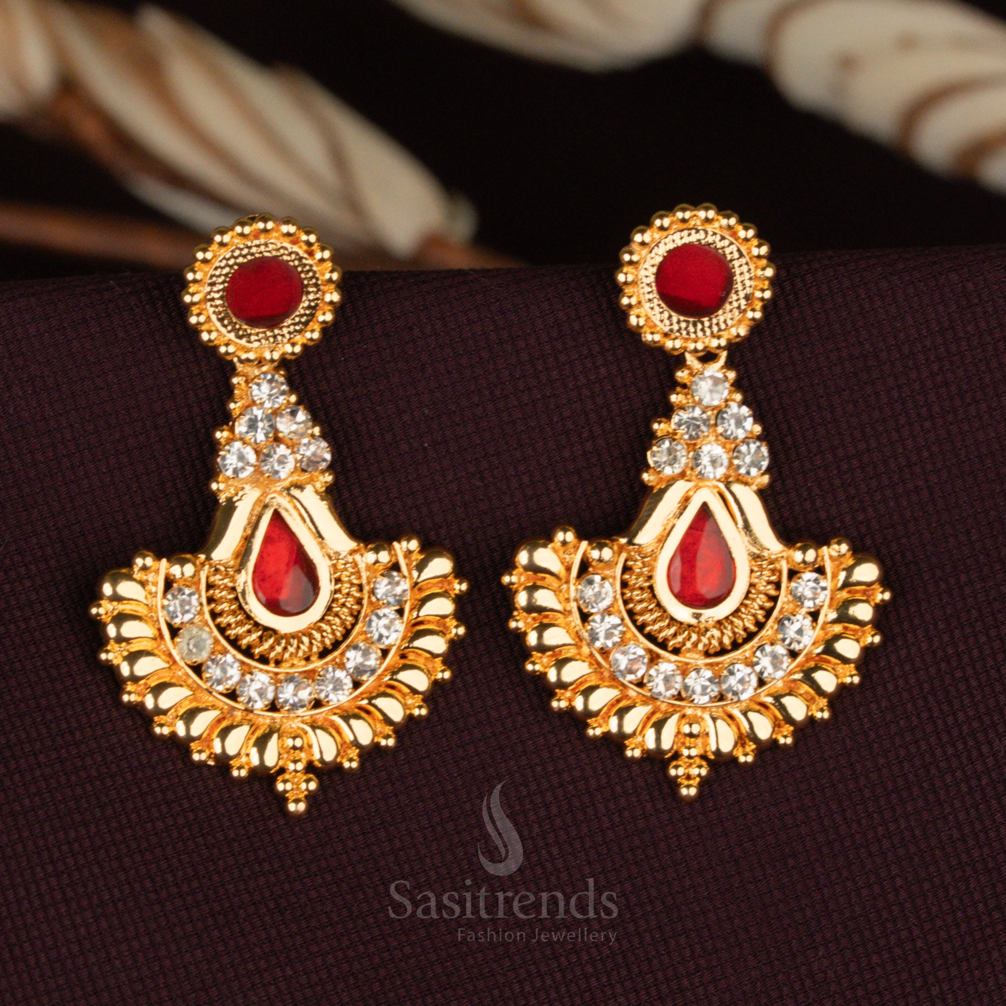 Temple wear Hanging Palakka Earrings, showcasing a graceful tear-drop design with gold craftsmanship and premium AD stone accents – Sasitrends